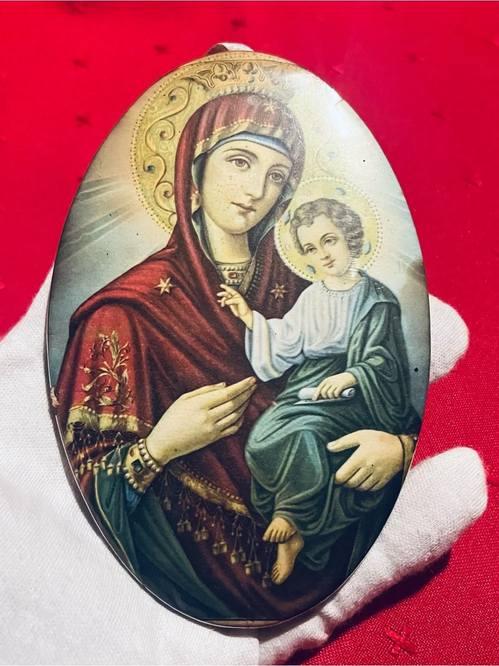 Vintage Eastern Orthodox icon depicting the Virgin Mary holding the Child Jesus
